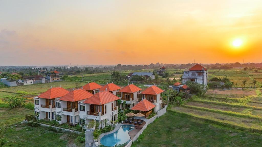 an aerial view of a house with a pool at Odessa Village by Pramana Villas in Gianyar