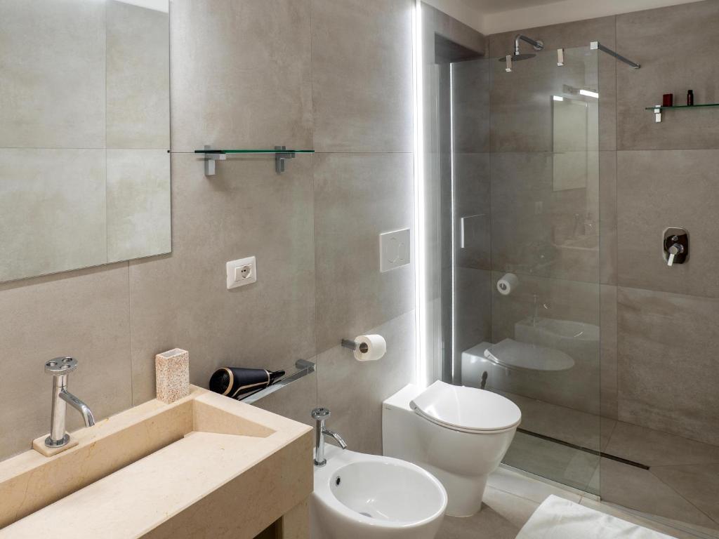 Koupelna v ubytování Lucente Rooms & Suites