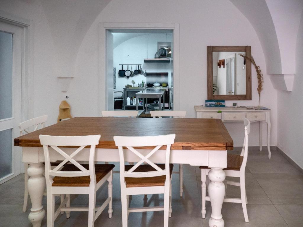 Kuchyň nebo kuchyňský kout v ubytování Lucente Rooms & Suites