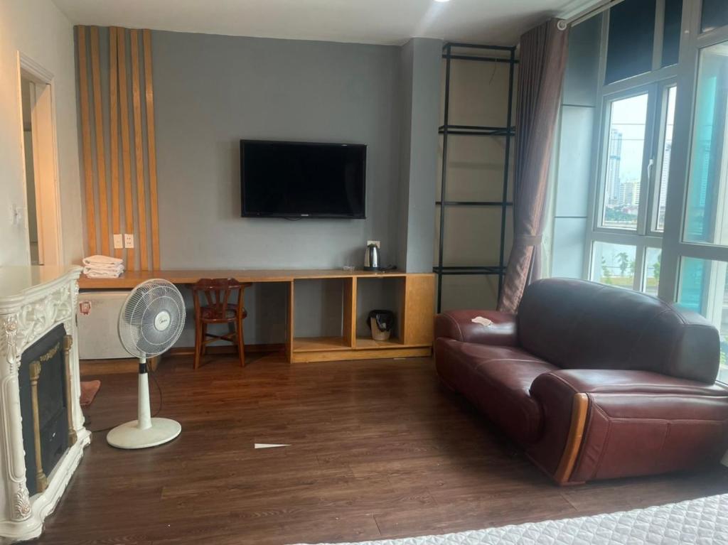 TV a/nebo společenská místnost v ubytování THỦY TÚ HOTEL