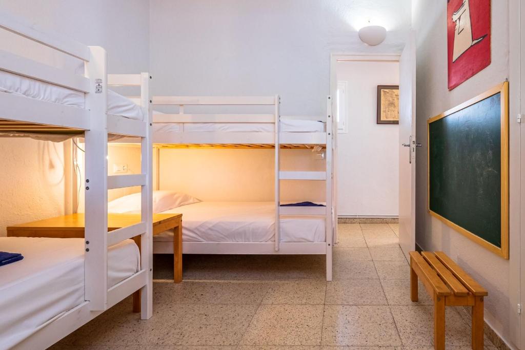 Posteľ alebo postele v izbe v ubytovaní Costabravaforrent Masramon