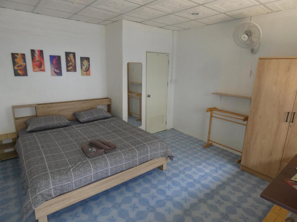 Postel nebo postele na pokoji v ubytování Lemon Guesthouse