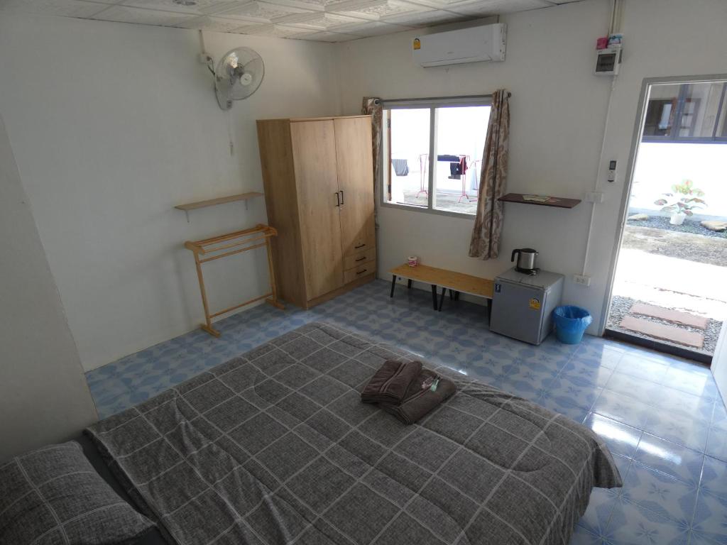 Postel nebo postele na pokoji v ubytování Lemon Guesthouse