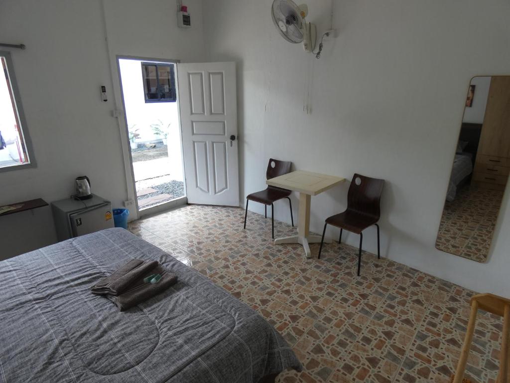 Postel nebo postele na pokoji v ubytování Lemon Guesthouse