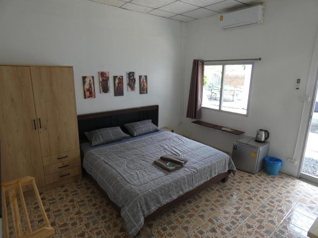 Postel nebo postele na pokoji v ubytování Lemon Guesthouse