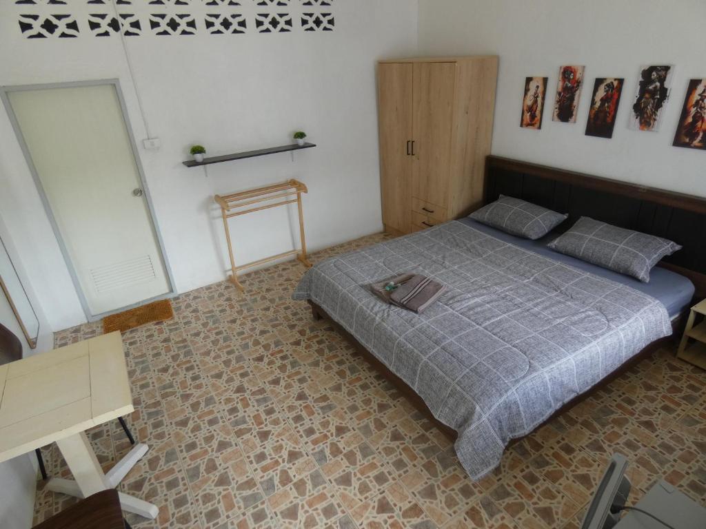 Postel nebo postele na pokoji v ubytování Lemon Guesthouse