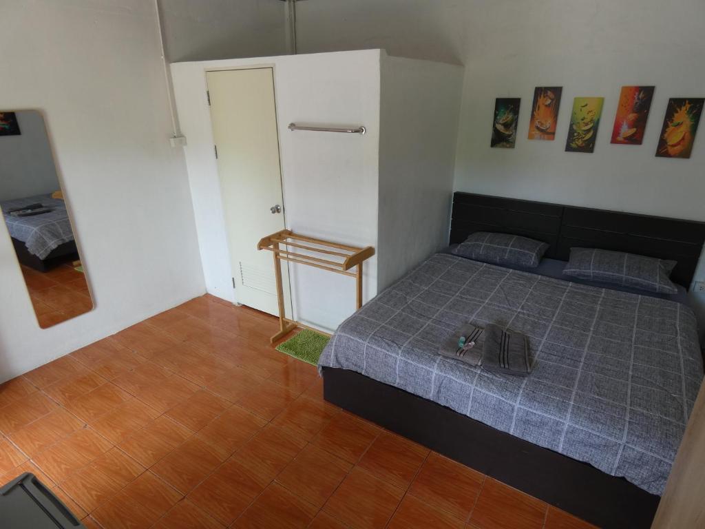 Postel nebo postele na pokoji v ubytování Lemon Guesthouse