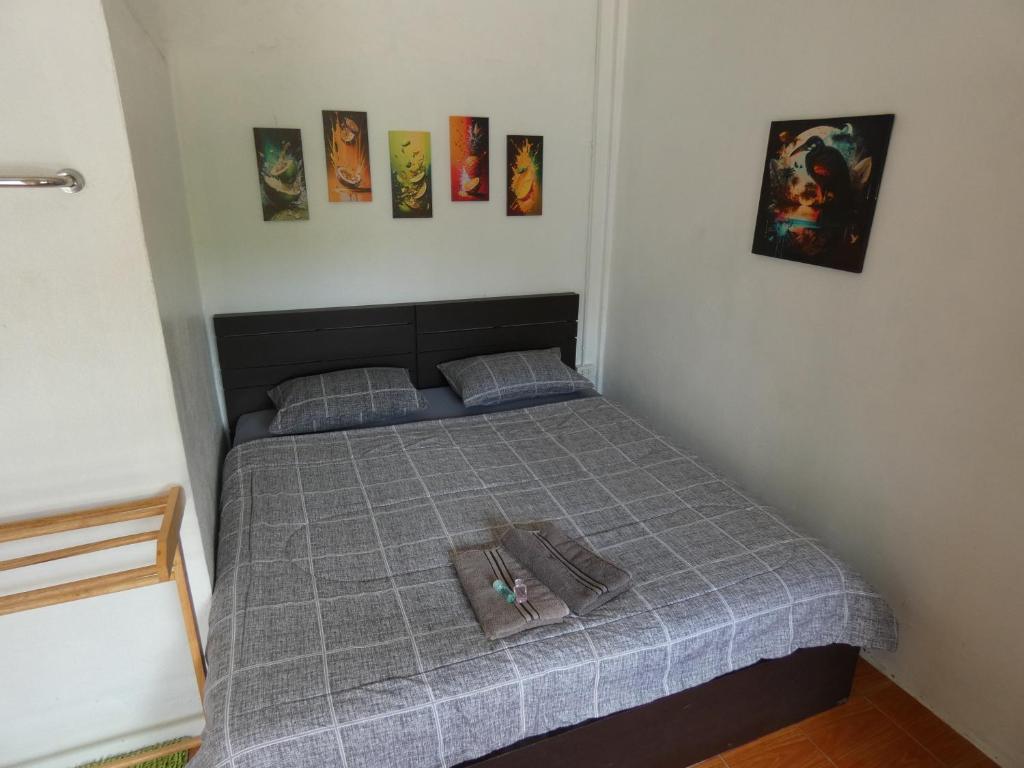 Postel nebo postele na pokoji v ubytování Lemon Guesthouse