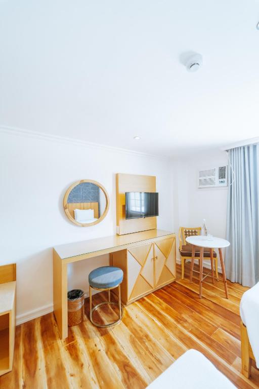 TV a/nebo společenská místnost v ubytování Sugarland Hotel