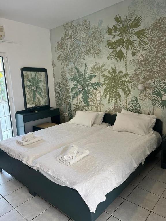 Postel nebo postele na pokoji v ubytování Cost Mari Almyrida New by ZAGO Boutiqe hotels