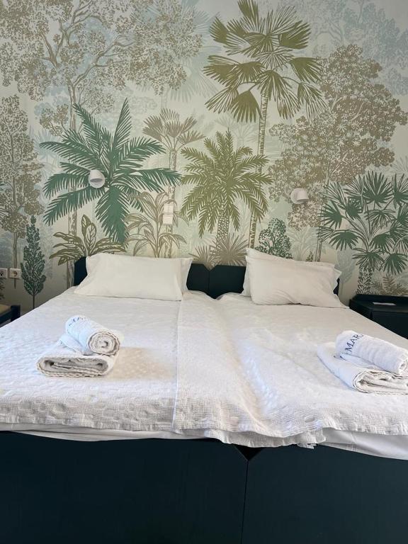 Postel nebo postele na pokoji v ubytování Cost Mari Almyrida New by ZAGO Boutiqe hotels