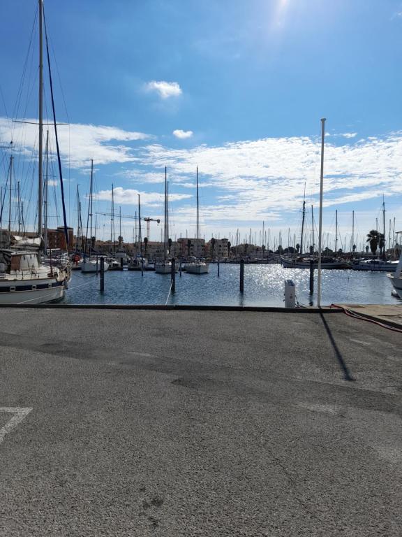 a marina with many boats in the water at La grande bleue in Port Leucate
