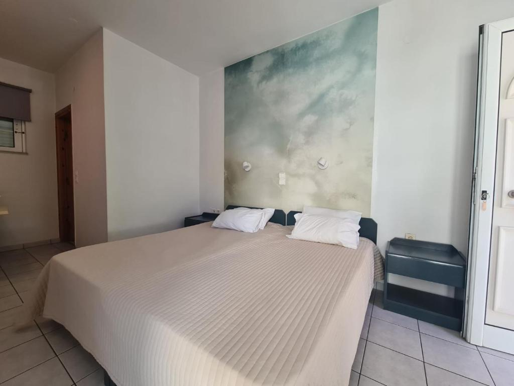Postel nebo postele na pokoji v ubytování Cost Mari Almyrida New by ZAGO Boutiqe hotels