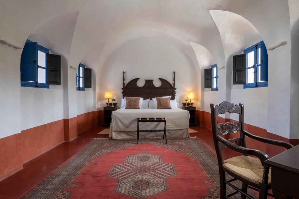 Postel nebo postele na pokoji v ubytování Monasterio de San Francisco