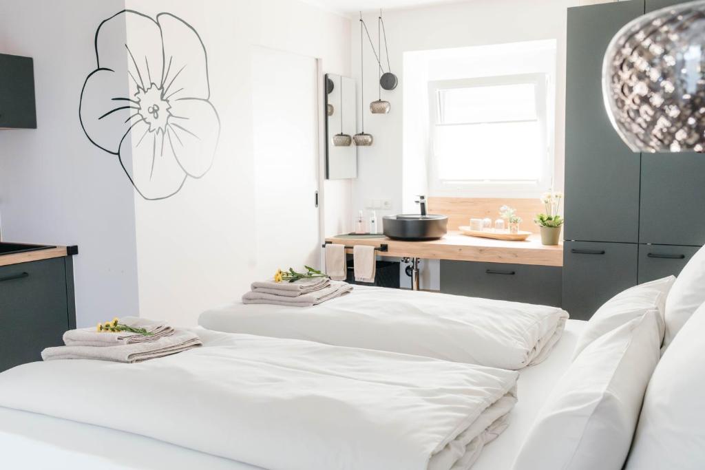 Кровать или кровати в номере Pension Blumenwiese