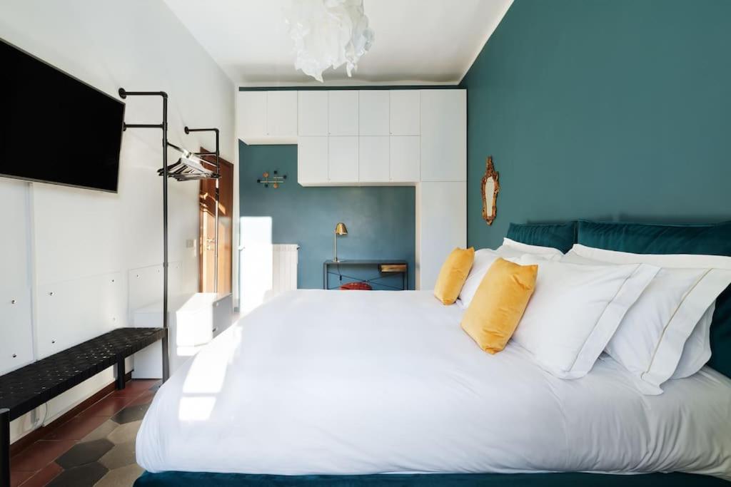 A bed or beds in a room at Cozy apartment in Trastevere