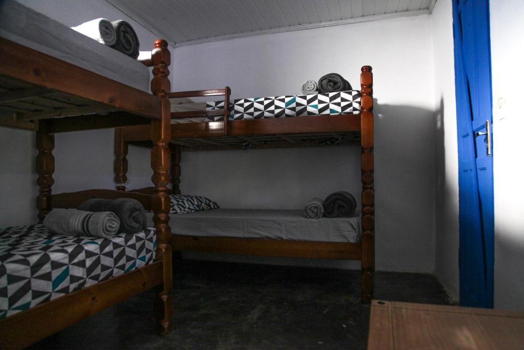 Postel nebo postele na pokoji v ubytování Calango Hostel