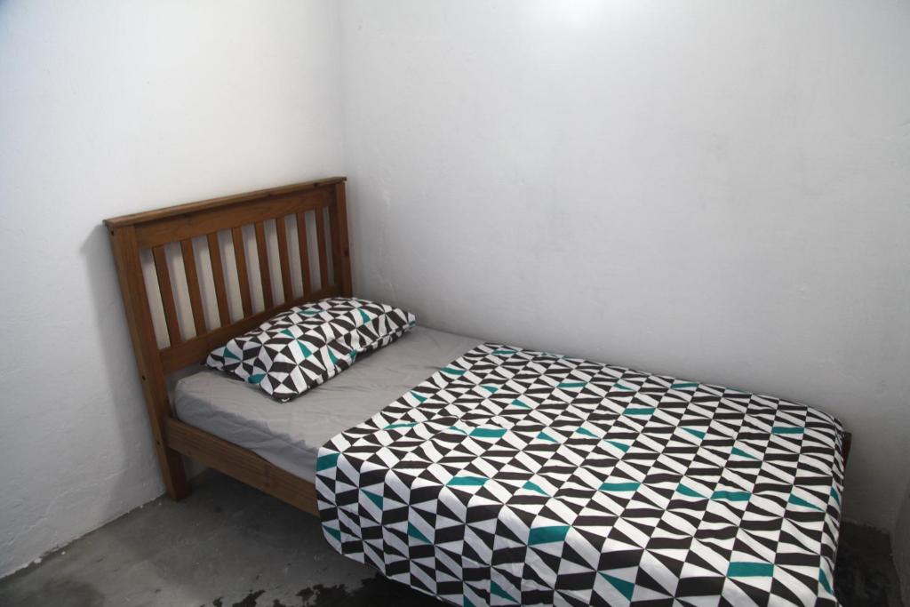 Postel nebo postele na pokoji v ubytování Calango Hostel