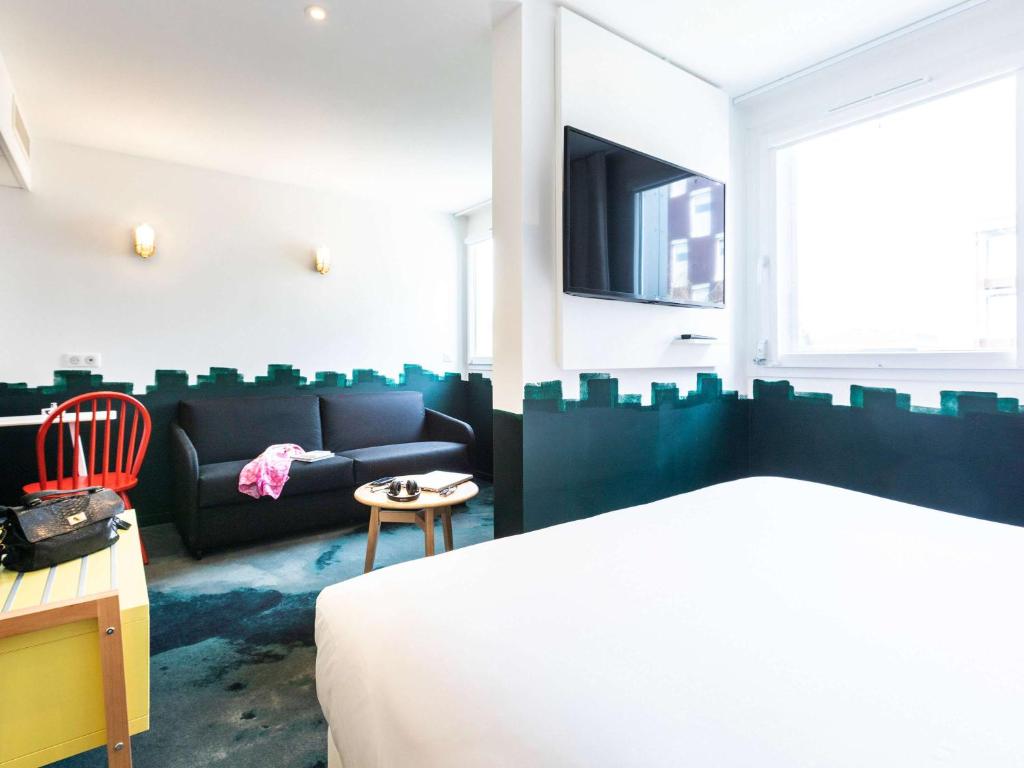 TV a/nebo společenská místnost v ubytování ibis Styles Thonon-les-Bains