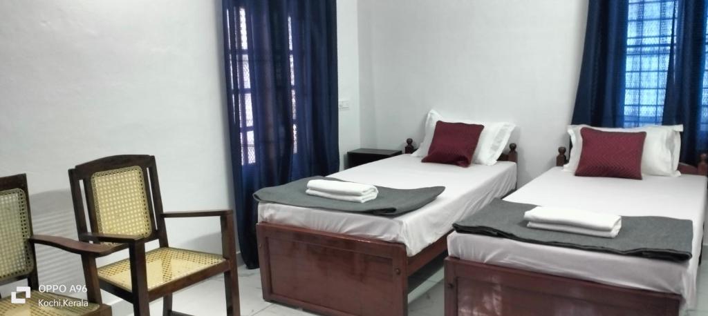 Letto o letti in una camera di Guestland Homestay