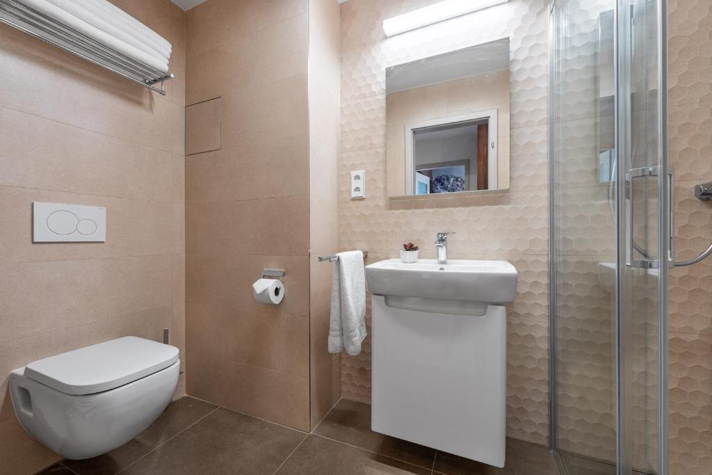 Koupelna v ubytování Apartmán nahoře v Dole