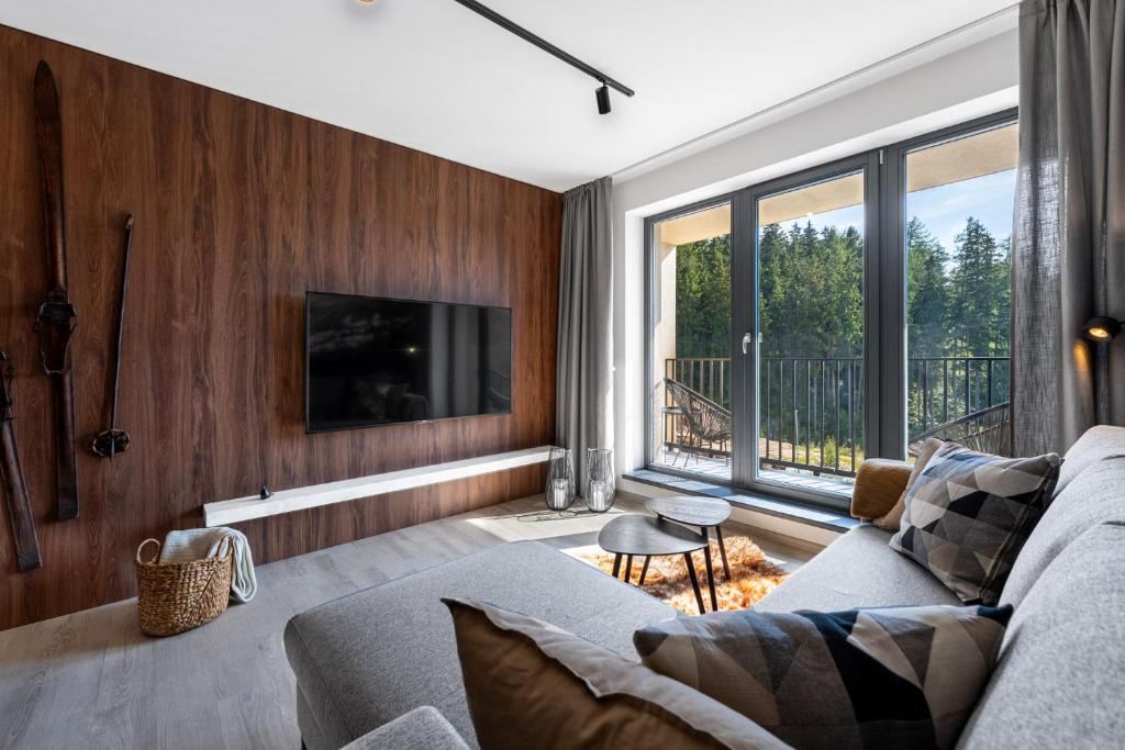 Posezení v ubytování Apartmán nahoře v Dole