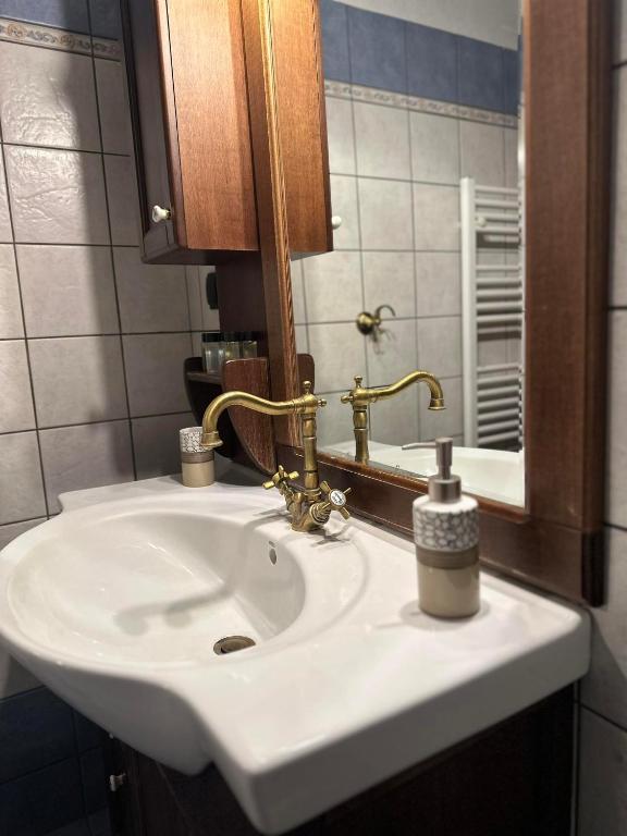 Koupelna v ubytování Arktouros Hotel