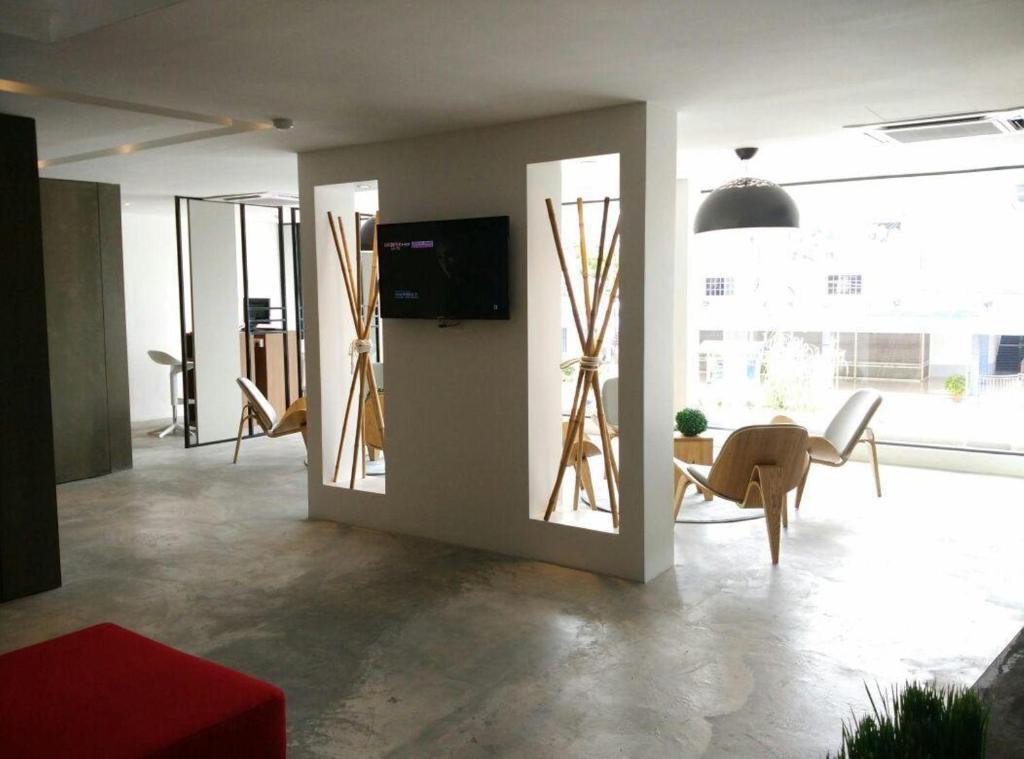 TV a/nebo společenská místnost v ubytování T+ Hotel Butterworth