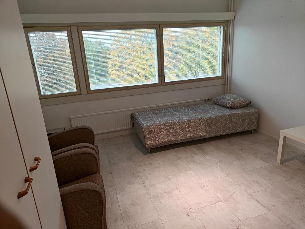 Katil atau katil-katil dalam bilik di Pet-friendly 4 Bed Apt in Turku with Park views