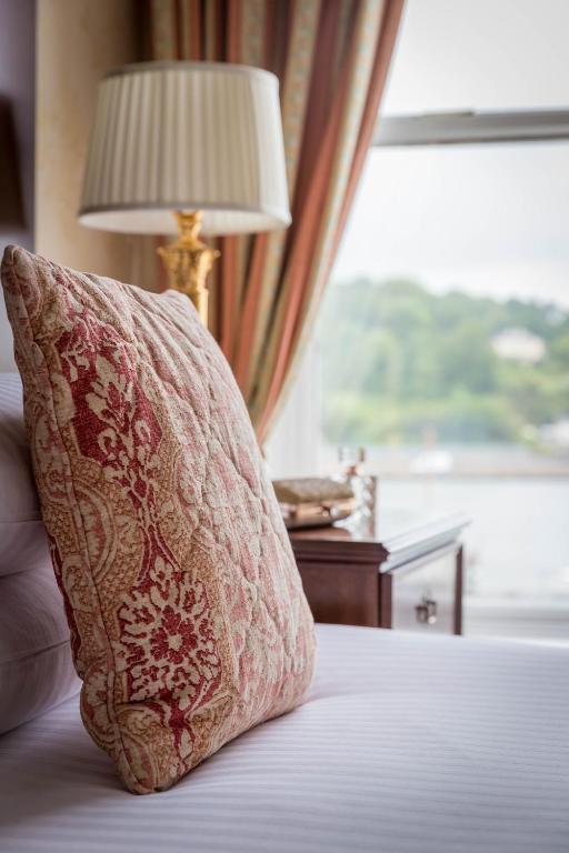 Postel nebo postele na pokoji v ubytování Granville Hotel