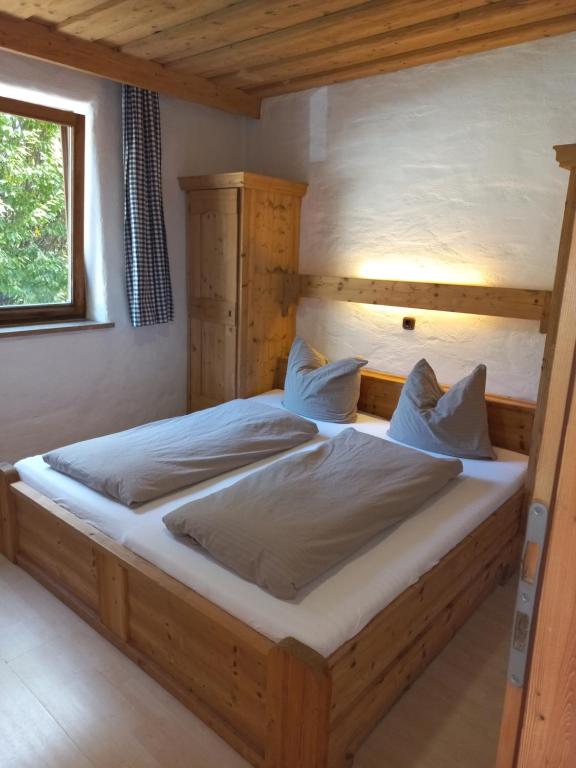 Postel nebo postele na pokoji v ubytování Scheffauerhof