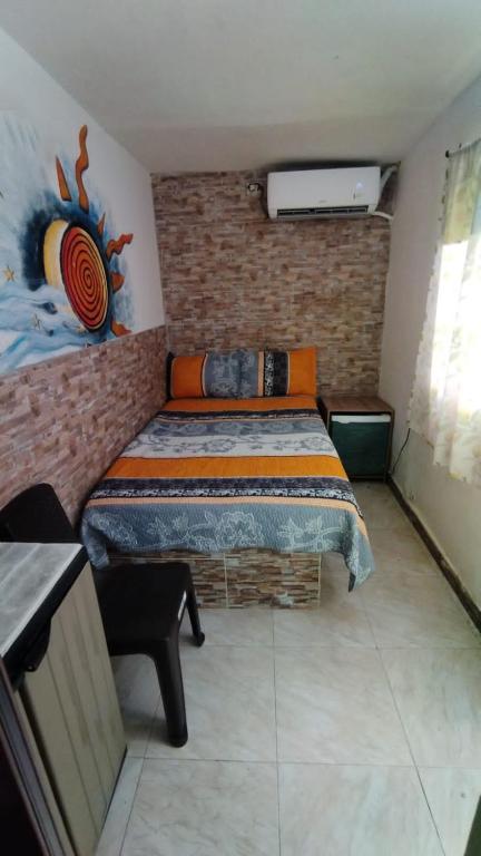 Postel nebo postele na pokoji v ubytování San Andrés Vive Paradise Habitaciones con baño privado a 80mts de la playa principal