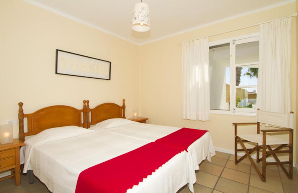 A bed or beds in a room at Charming Lanzarote Villa Casa Tingu 3 Bedrooms Heated Private Pool Centre Of Resort Puerto Del Carmen