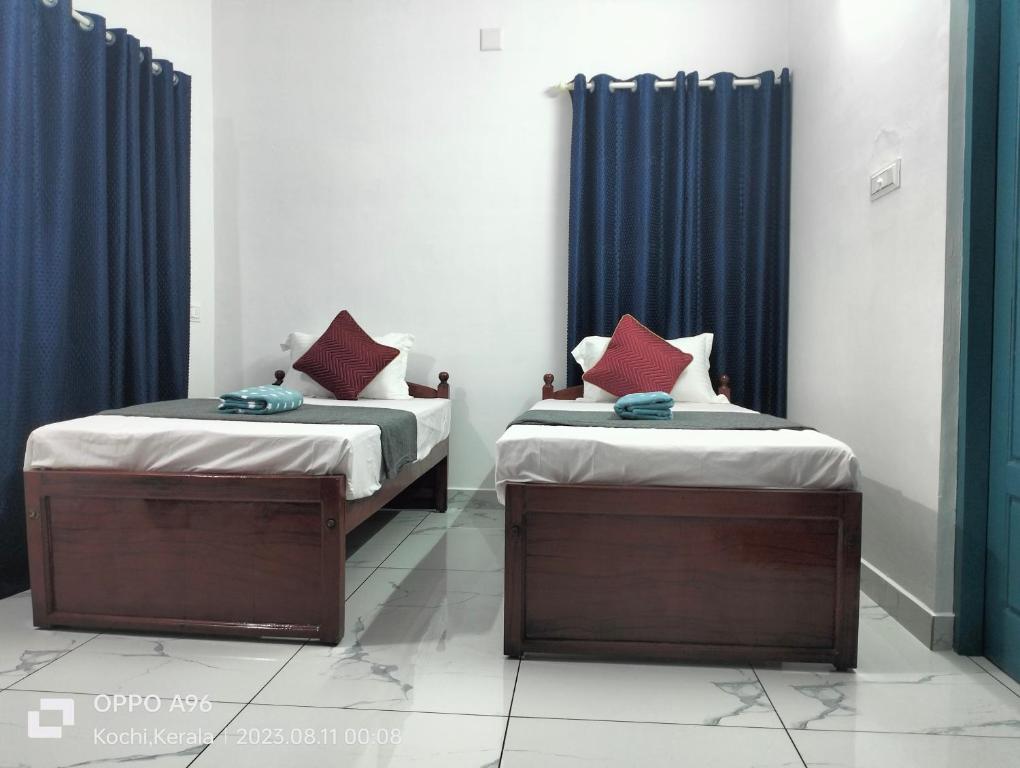 Letto o letti in una camera di Guestland Homestay