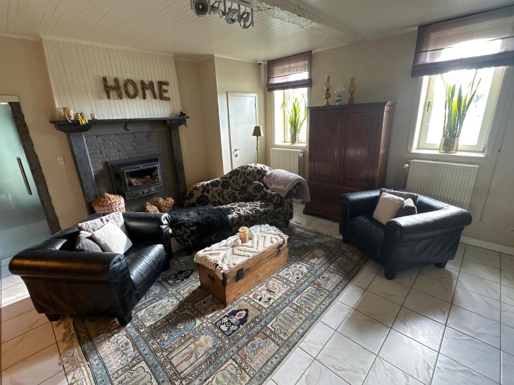 Posezení v ubytování De Verborgen Parel B&B