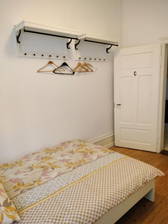 Postel nebo postele na pokoji v ubytování City Home Zurich