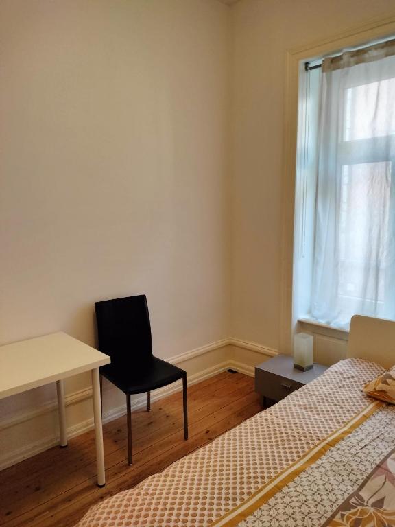 Postel nebo postele na pokoji v ubytování City Home Zurich