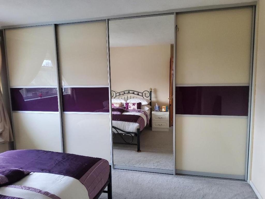 Postel nebo postele na pokoji v ubytování Haven Home