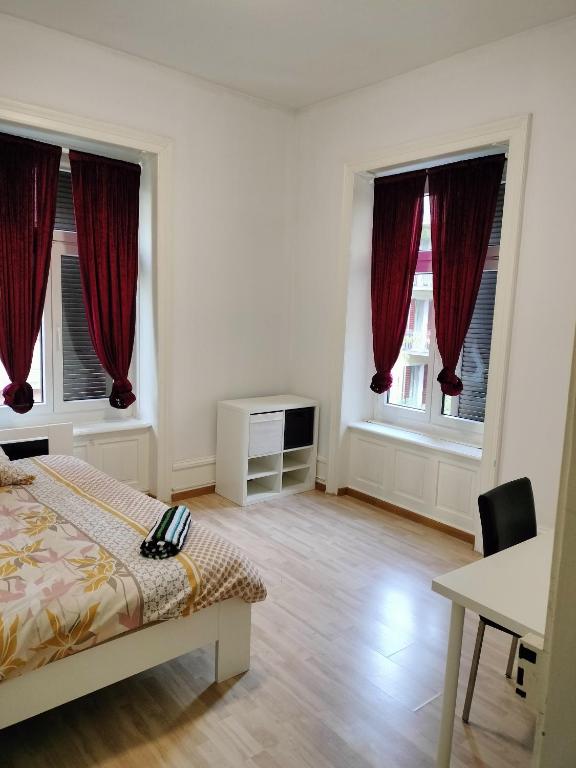 Postel nebo postele na pokoji v ubytování City Home Zurich