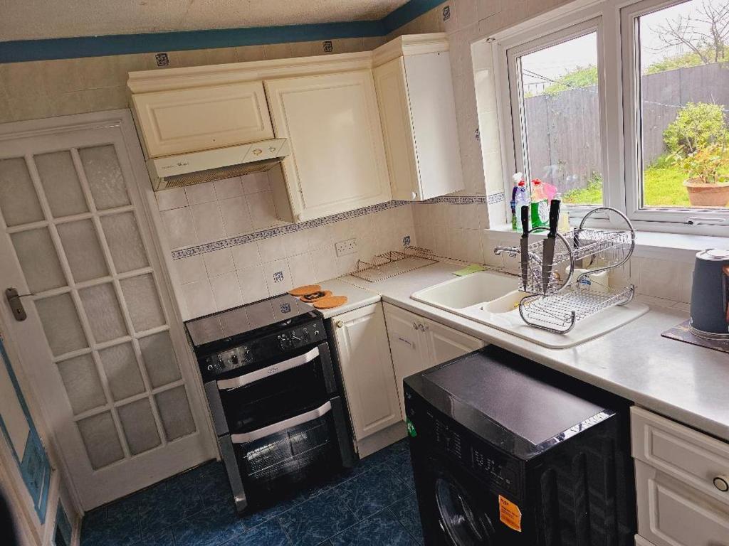 Kuchyň nebo kuchyňský kout v ubytování Haven Home
