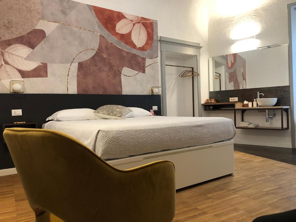 Postel nebo postele na pokoji v ubytování DIMOR'A' ROOMS