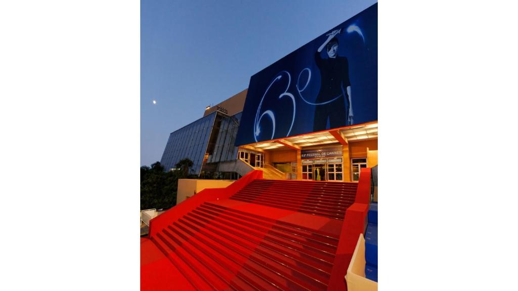 a red escalator in front of a building at GRAY 2a6 in Cannes