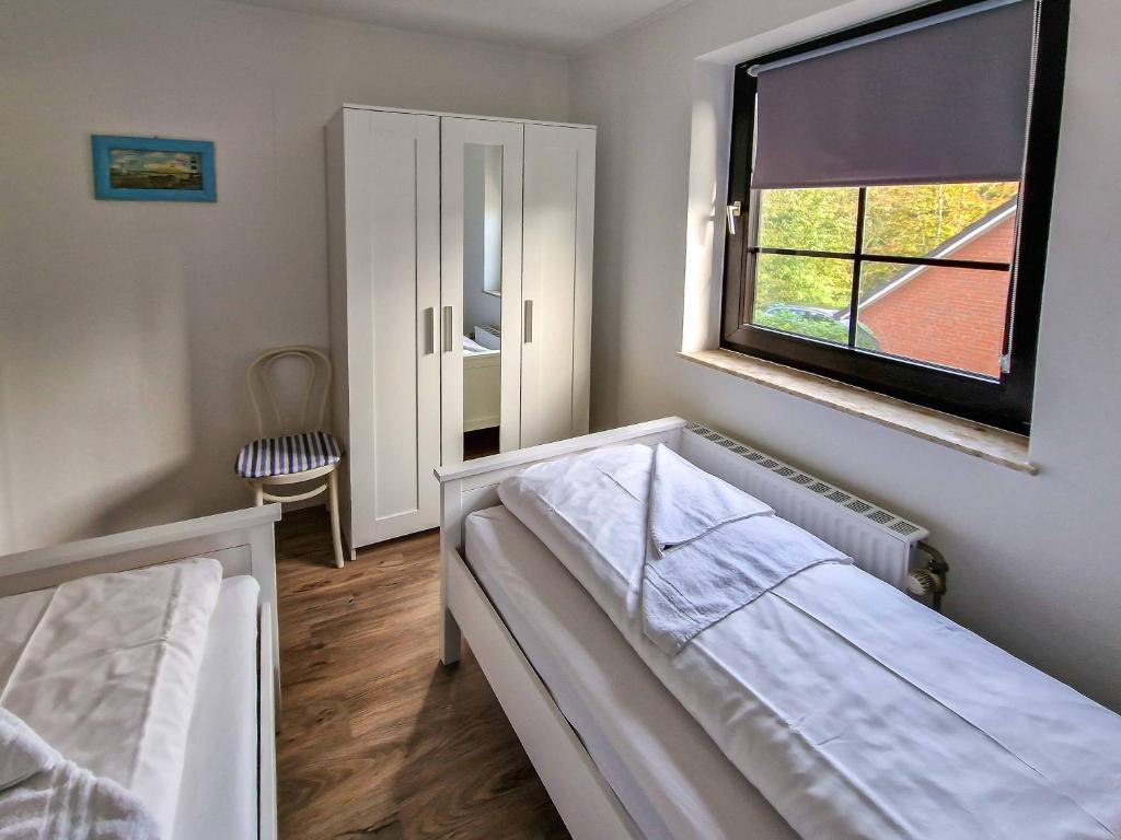 Postel nebo postele na pokoji v ubytování Seezunge