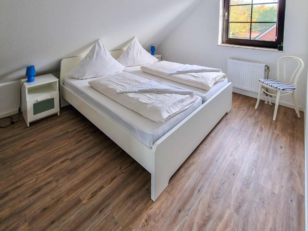 Postel nebo postele na pokoji v ubytování Seezunge