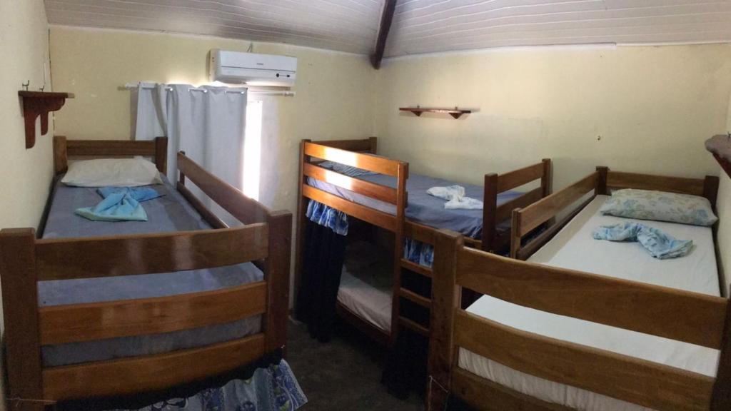 Postel nebo postele na pokoji v ubytování Hostel Jericoacoariano