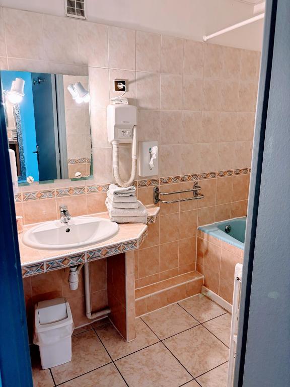 Koupelna v ubytování Brasilia Hôtel
