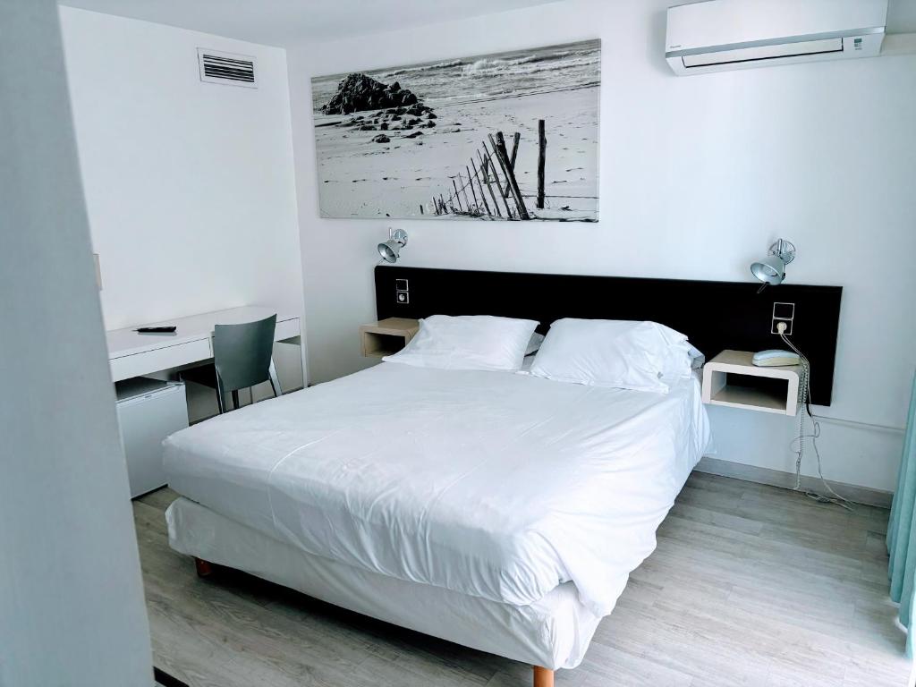 Postel nebo postele na pokoji v ubytování Brasilia Hôtel