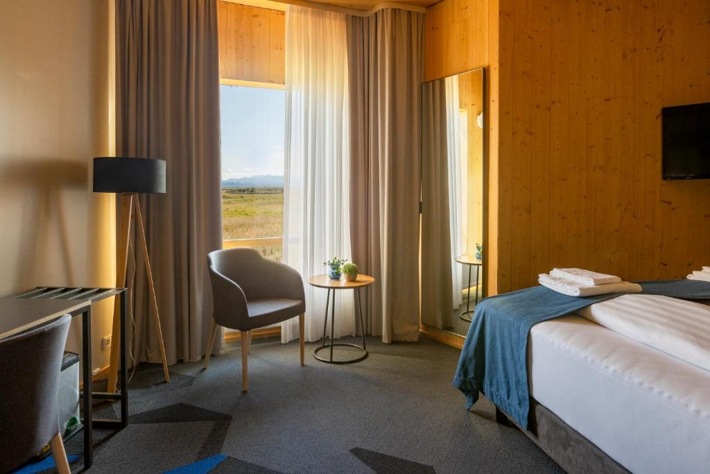 Postel nebo postele na pokoji v ubytování Landhotel