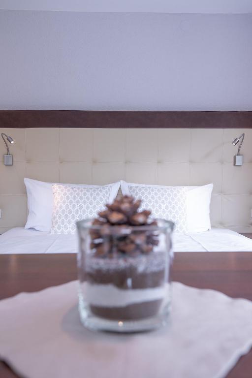 Postel nebo postele na pokoji v ubytování Patteriol Apart-Hotel-Garni