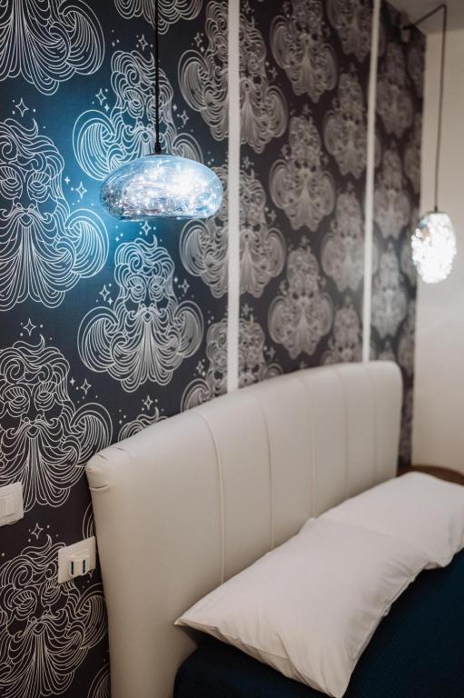 Postel nebo postele na pokoji v ubytování Brezza